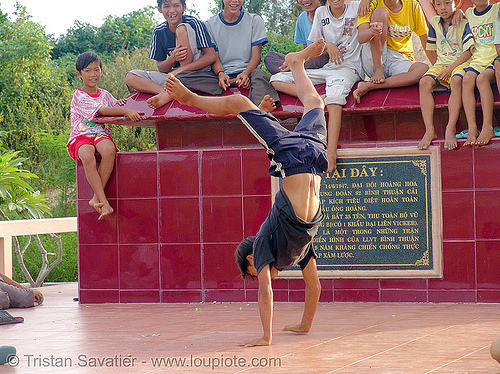 handstand - kid break-dancing - vietnam, boys, break dance, break dancing, children, communism, handstand, kids, memorial, monument, phan thiet, victory