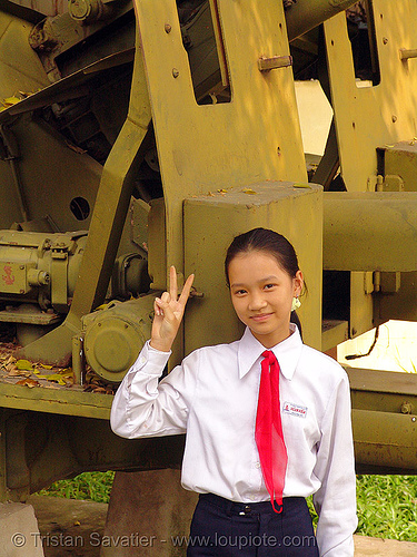 us artillery - war - vietnam, army museum, girl, hanoi, military, peace sign, red tie, v sign, victory sign, vietnam war