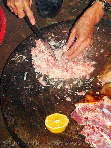 dog meat - chopping-up some unidentified organ - thịt chó - vietnam, butcher knife, chopped, chopping, cleaver, food dog, raw meat, vietnam